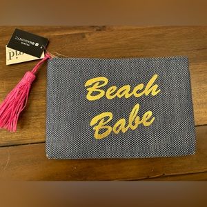 Insulated clutch with Beach Babe printed on face